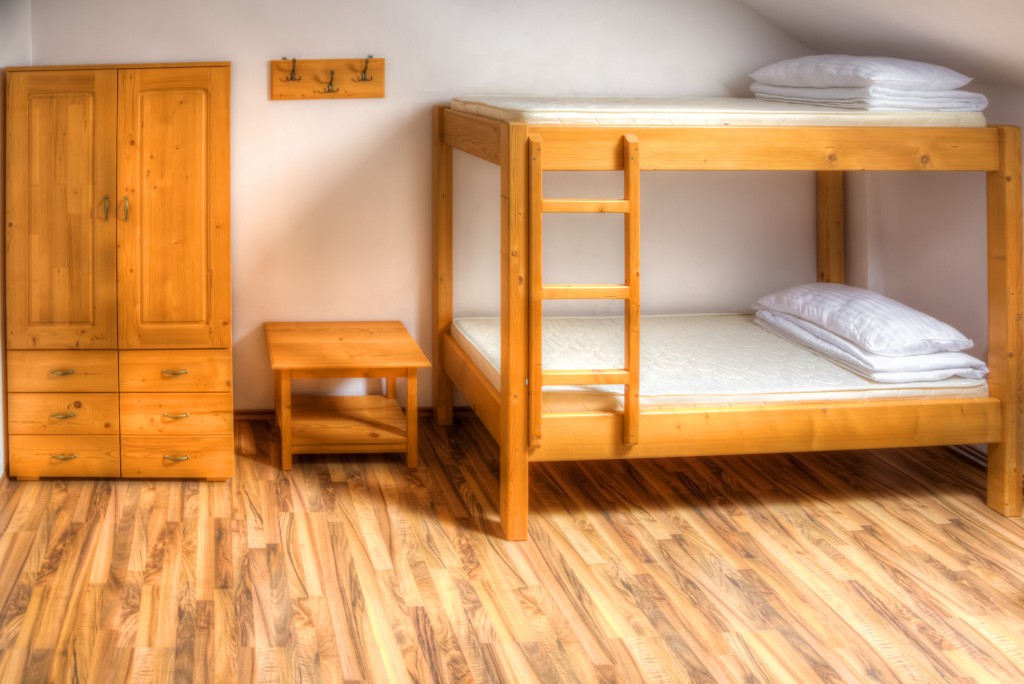 hostel with bunk bed and wooden flooring