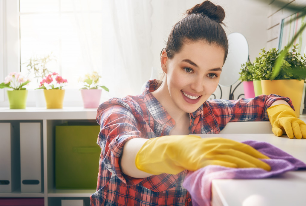 teen doing household chores